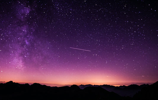 Purple starry night sky with the Milky Way, the effect a galaxy projector recreates indoors